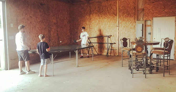 Rec Barn has ping pong, bar table, and 12 person picnic table